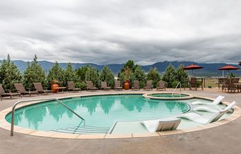 Pool with mountain backdrop at Vistas at Jackson Creek, Monument, CO